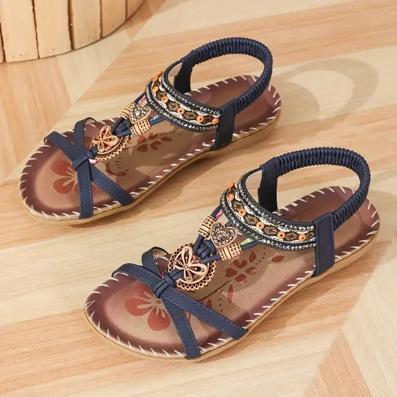 Colella | Sandali eleganti decorati con fiori e una farfalla in strass