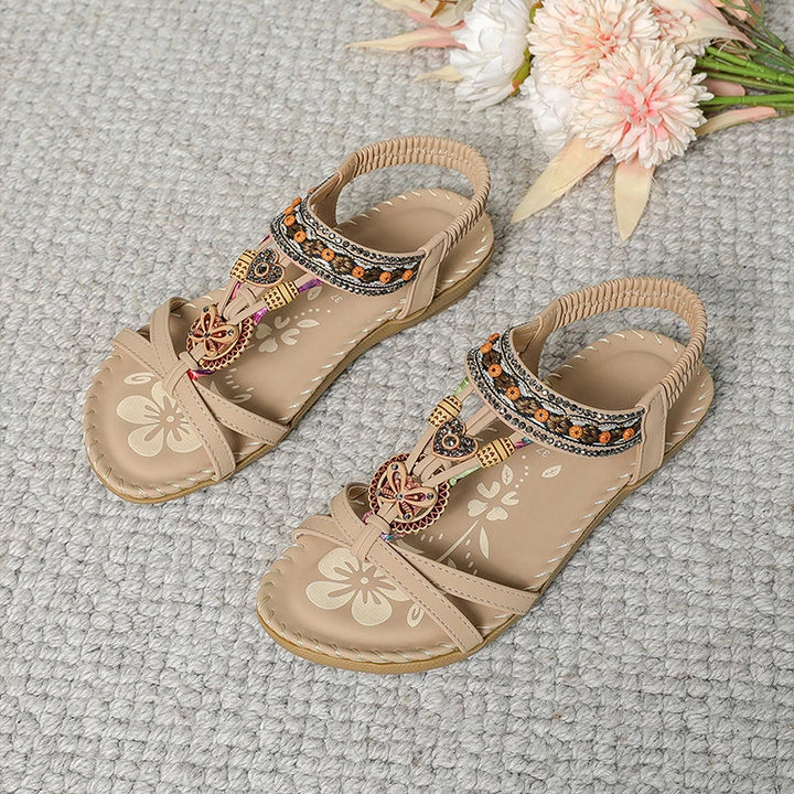 Colella | Sandali eleganti decorati con fiori e una farfalla in strass